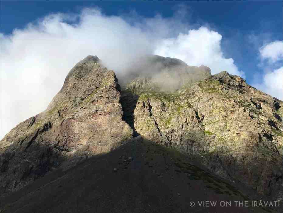 Cleft peak of Khundī Mātā peak disappearing into the clouds