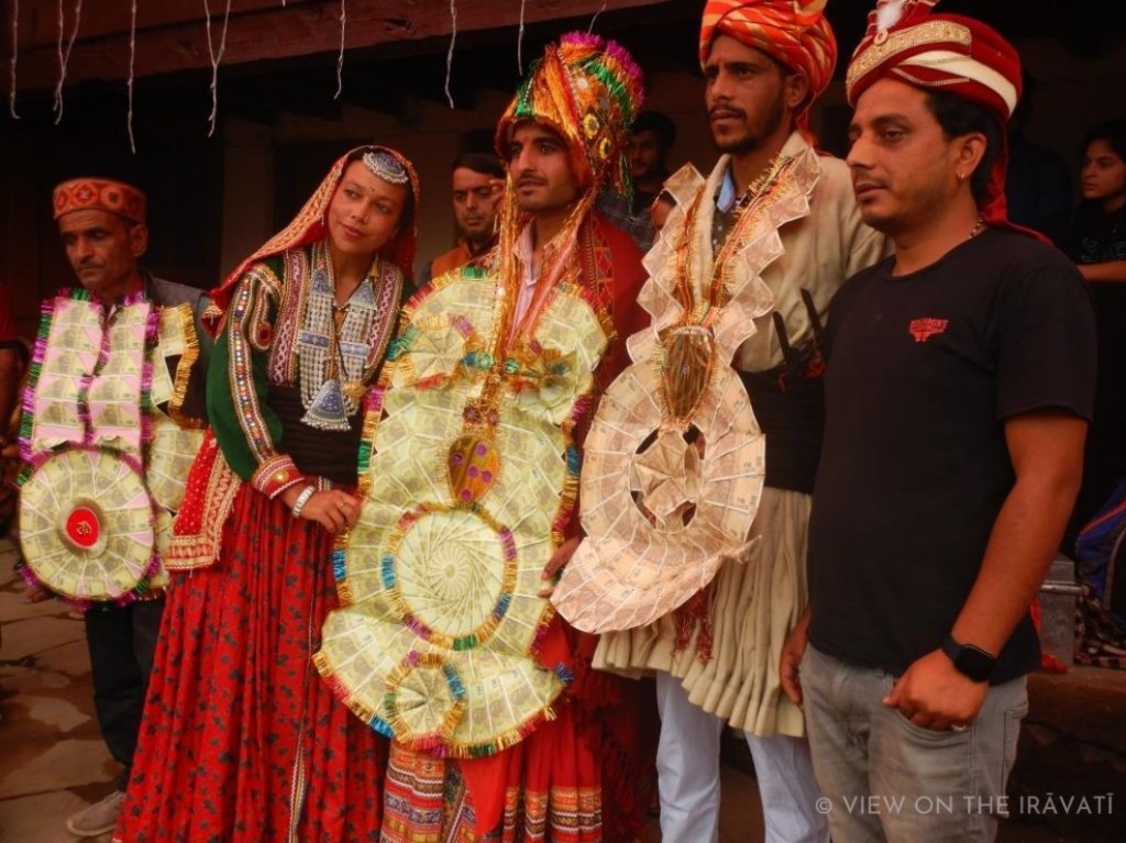 Gaddi wedding picture with groom, pachenk, wearing haar of rupees