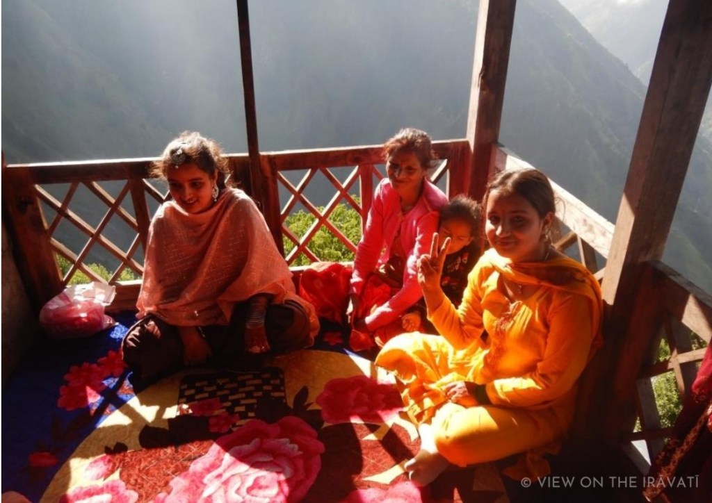 Kids sitting on sunlit veranda